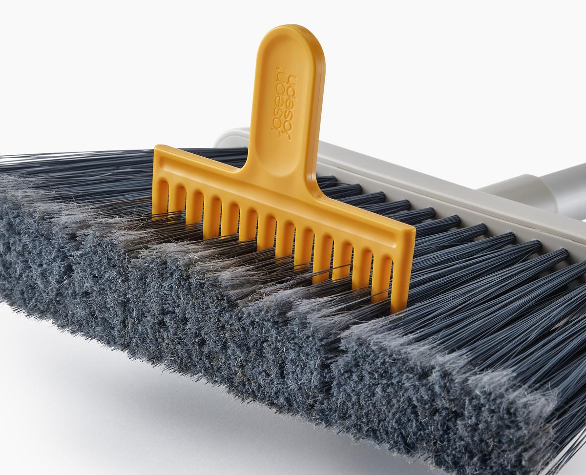CleanTech™ Wall-Mounted Broom